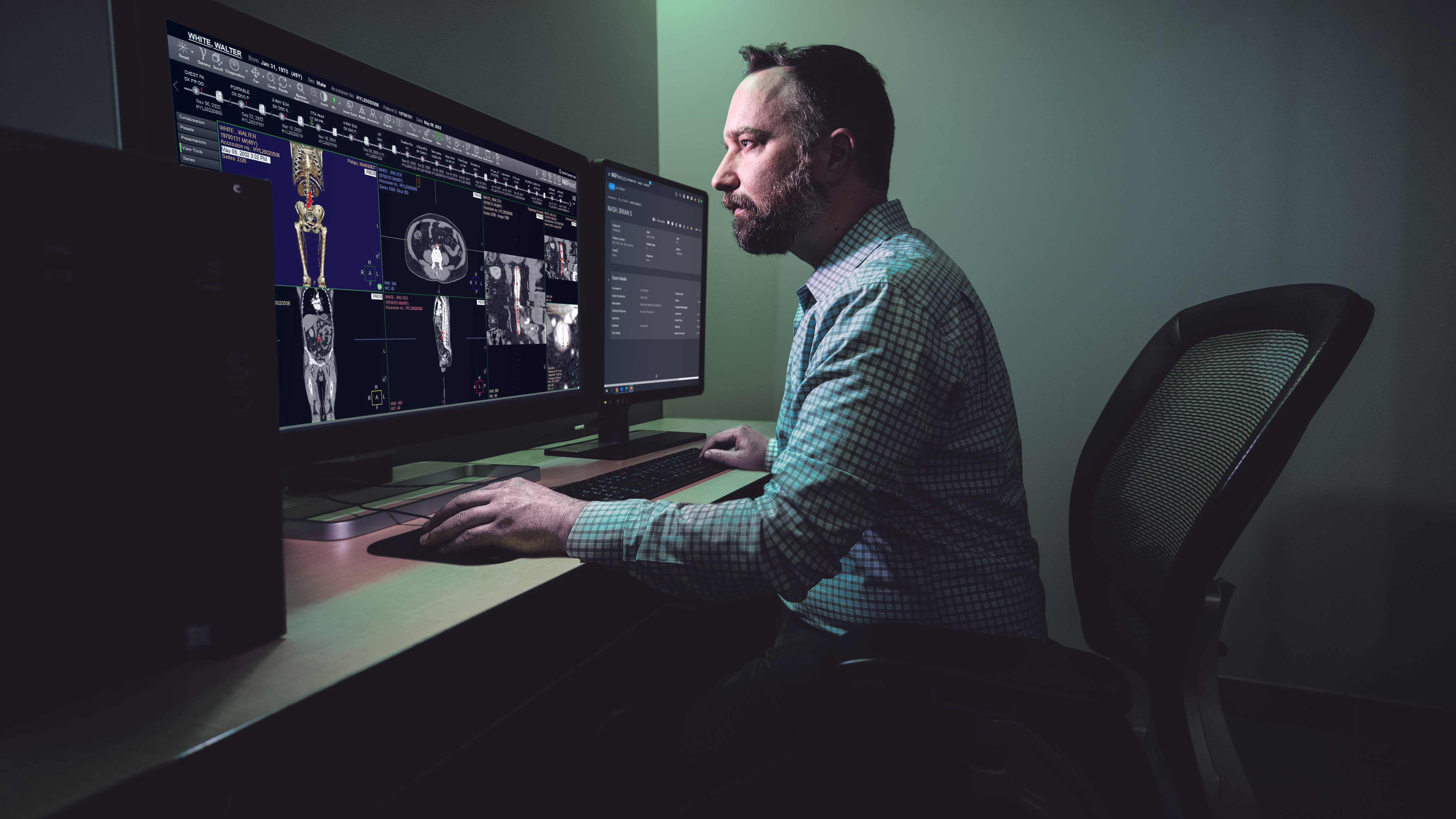Healthcare professional views medical images on a desktop computer.